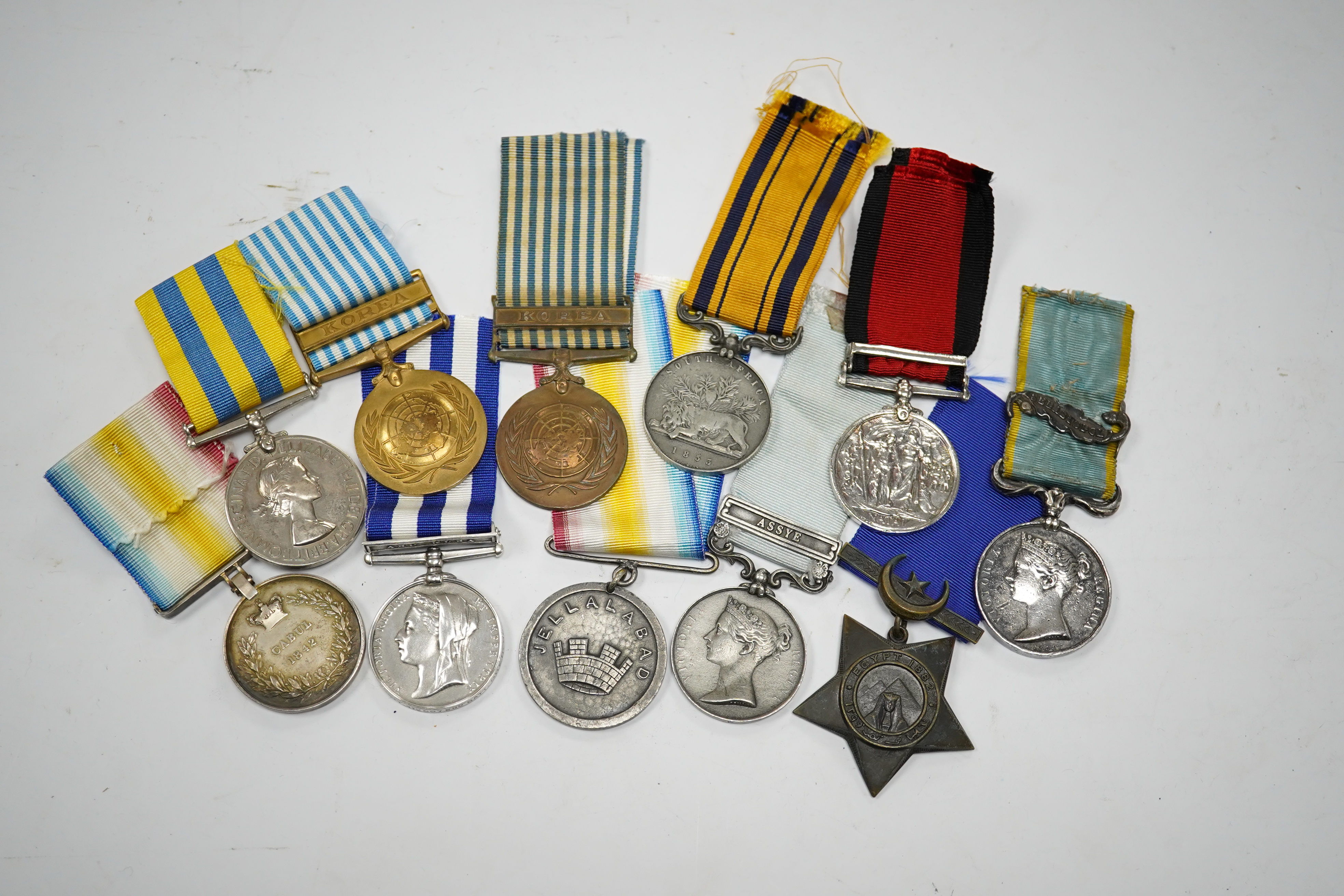 Eleven military medals, most are replica examples, etc. including